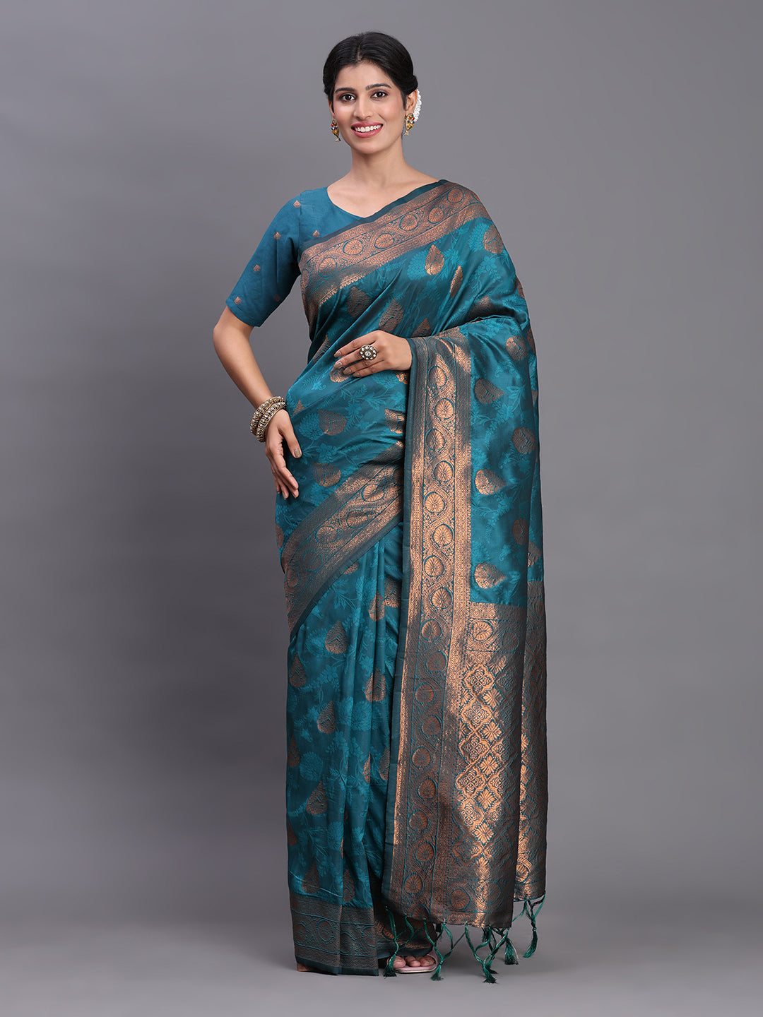 Astita Teal Blue Banarasi Silk Saree with Copper Zari Woven Pallu & Feather Butta – Wedding & Festive Wear
