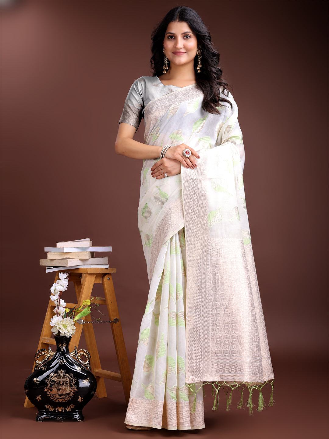 Astita Elegant White & Light Green Leaf Print Cotton Saree for Women with Zari Border & Tassels – Soft & Lightweight Daily Wear Saree