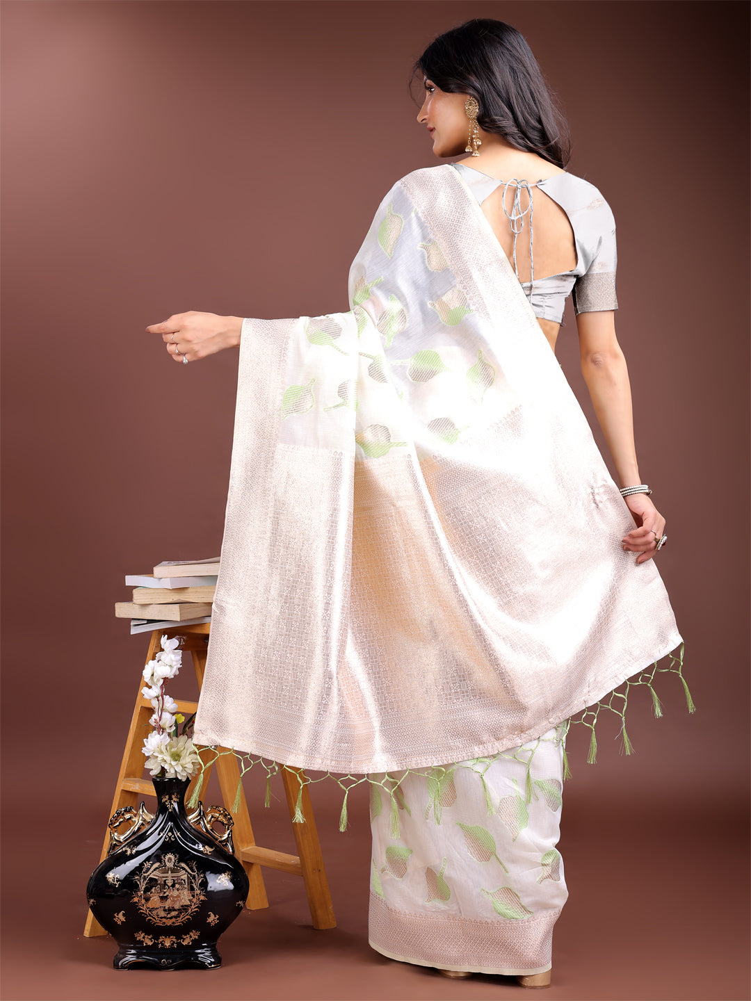 Astita Elegant White & Light Green Leaf Print Cotton Saree for Women with Zari Border & Tassels – Soft & Lightweight Daily Wear Saree