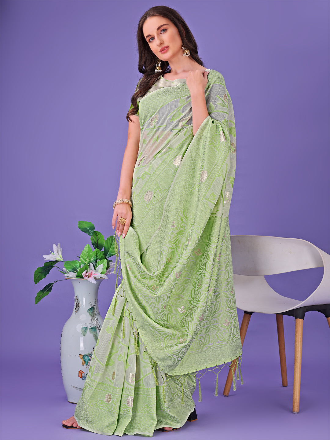 Astita Light Green Lichi Silk Saree with Floral Weaving & Tassel Pallu – Elegant Festive & Party Wear Saree