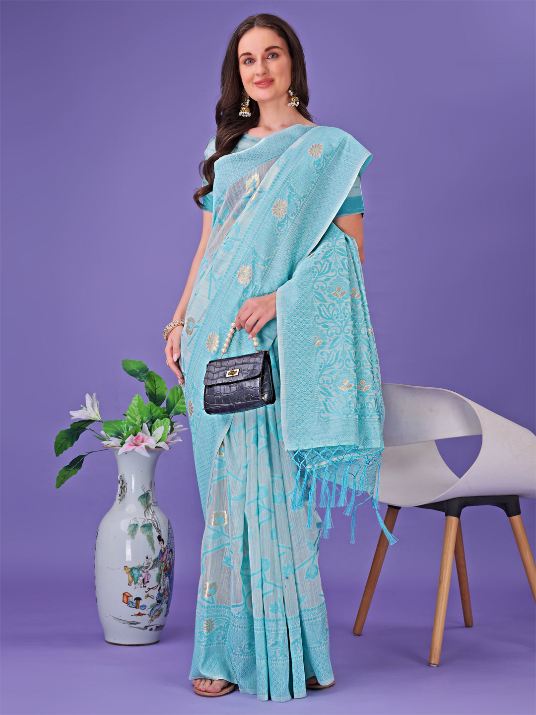 Astita Sky Blue Lichi Silk Saree with Floral Weaving & Tassel Pallu – Elegant Festive & Party Wear Saree