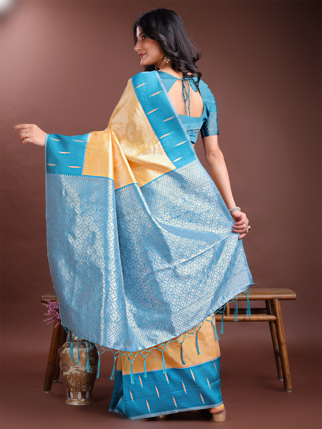 Astita Yellow & Sky Blue Lichi Silk Saree with Rich Zari Pallu & Tassels – Soft Festive Wear Saree for Women