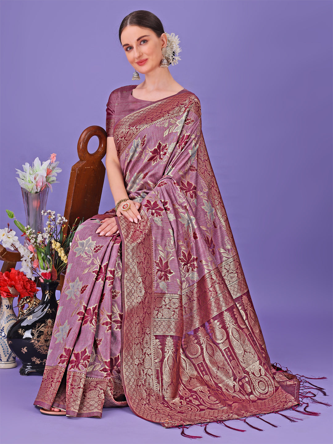 Astita Elegant Purple Floral Lichi Silk Saree with Zari Weaving and Rich Pallu – Wedding & Festive Wear Saree