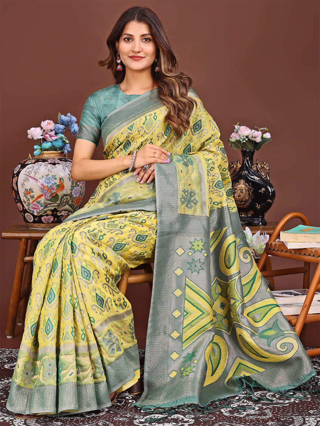 Astita Grace in Every Thread: Yellow Patola Linen Cotton Saree Woven with Cultural Elegance