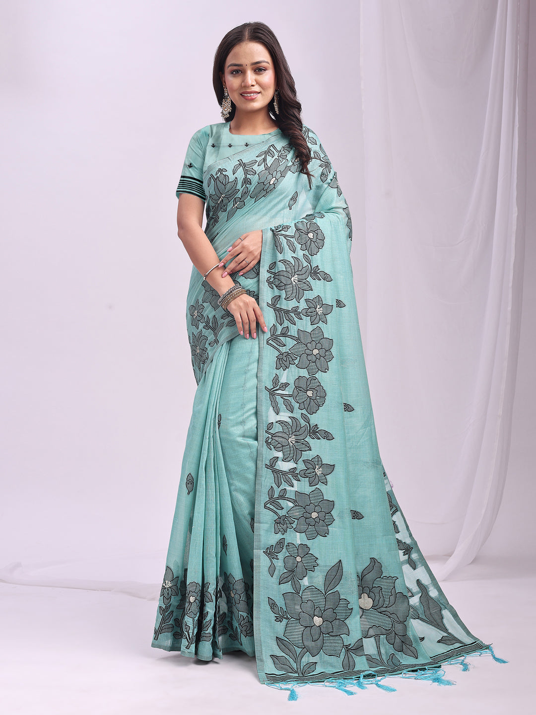 Astita Aqua Blue Linen Cotton Saree with Elegant Black Floral Print β Lightweight & Stylish Saree for Festive and Office Wear