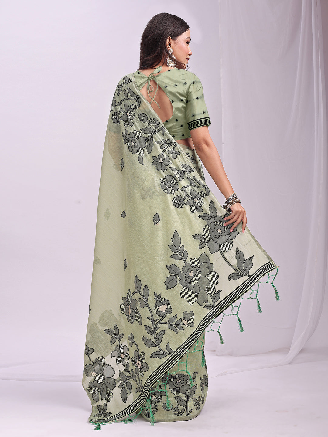 Astita Light Green Linen Cotton Saree with Elegant Black Floral Print – Lightweight & Stylish Saree for Festive and Office Wear