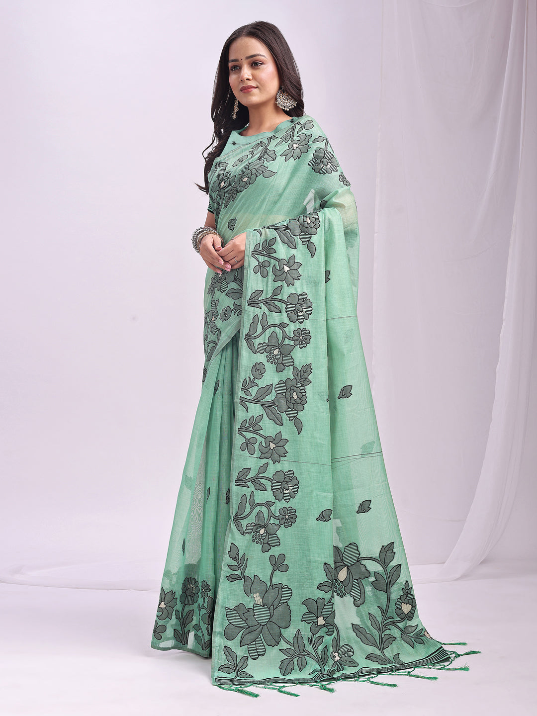 Astita Rama Green Linen Cotton Saree with Elegant Black Floral Print β Lightweight & Stylish Saree for Festive and Office Wear