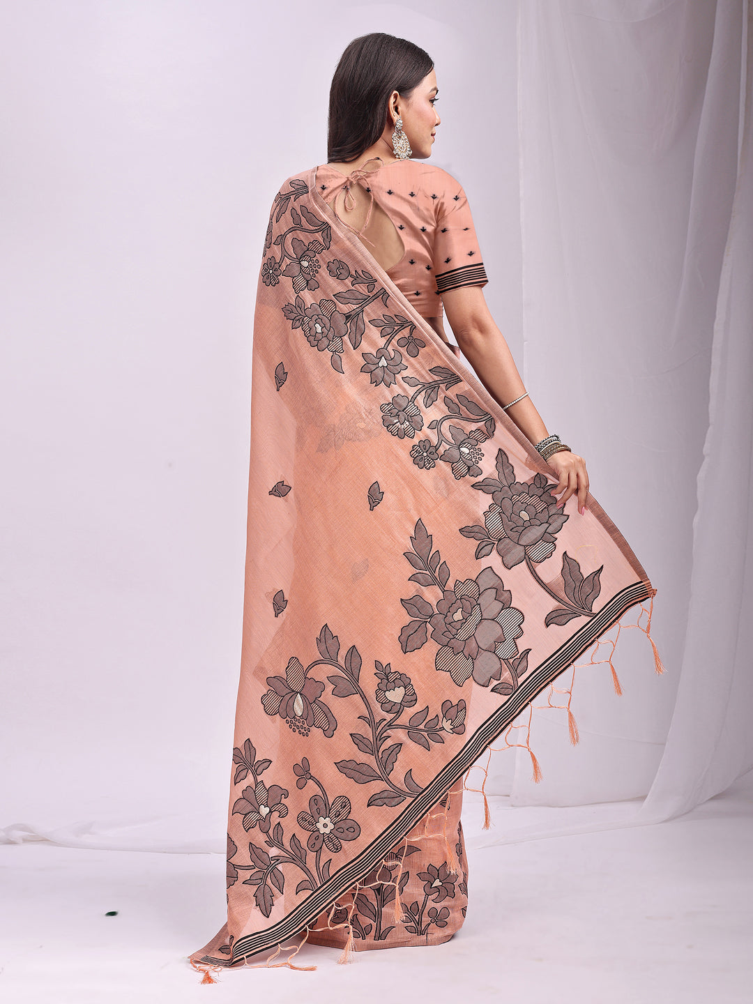Astita Orange Linen Cotton Saree with Elegant Black Floral Print β Lightweight & Stylish Saree for Festive and Office Wear