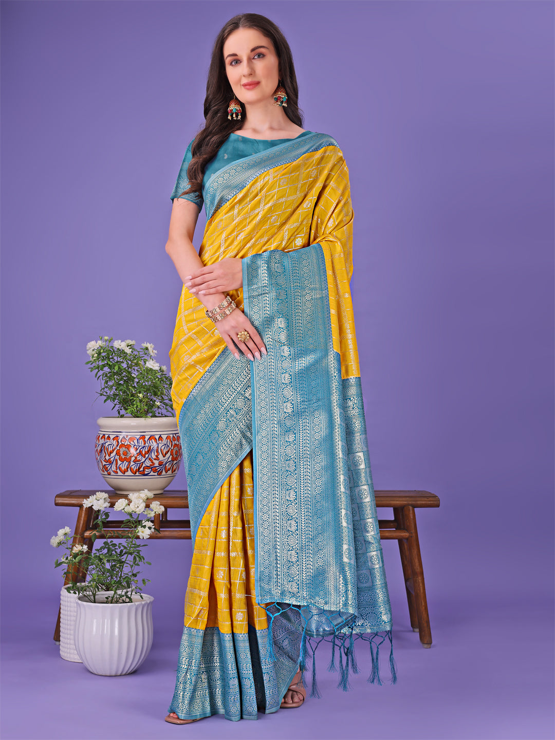 Astita Vibrant Yellow & Blue Lichi Silk Saree with Rich Woven Border and Contrast Blouse – Festive & Wedding Wear
