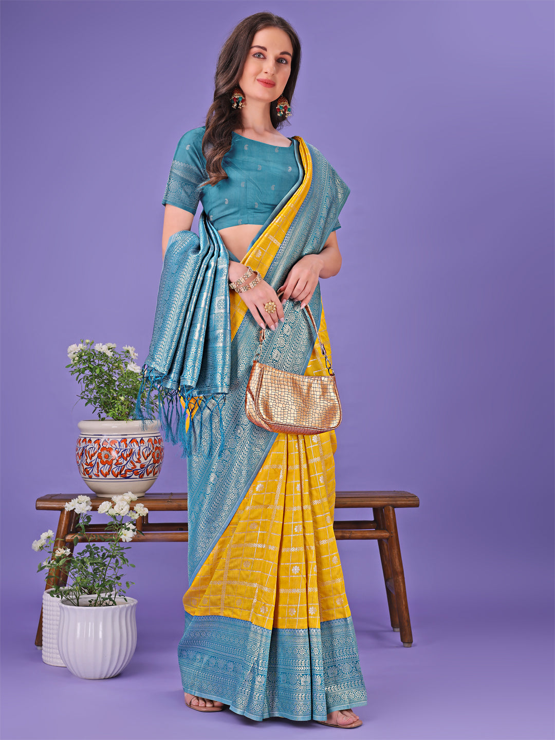 Astita Vibrant Yellow & Blue Lichi Silk Saree with Rich Woven Border and Contrast Blouse – Festive & Wedding Wear