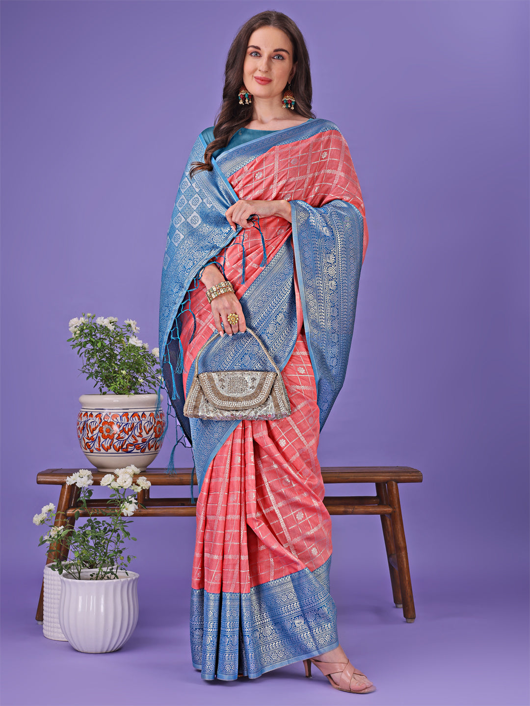 Astita Vibrant Peach & Teal Lichi Silk Saree with Rich Woven Border and Contrast Blouse – Festive & Wedding Wear