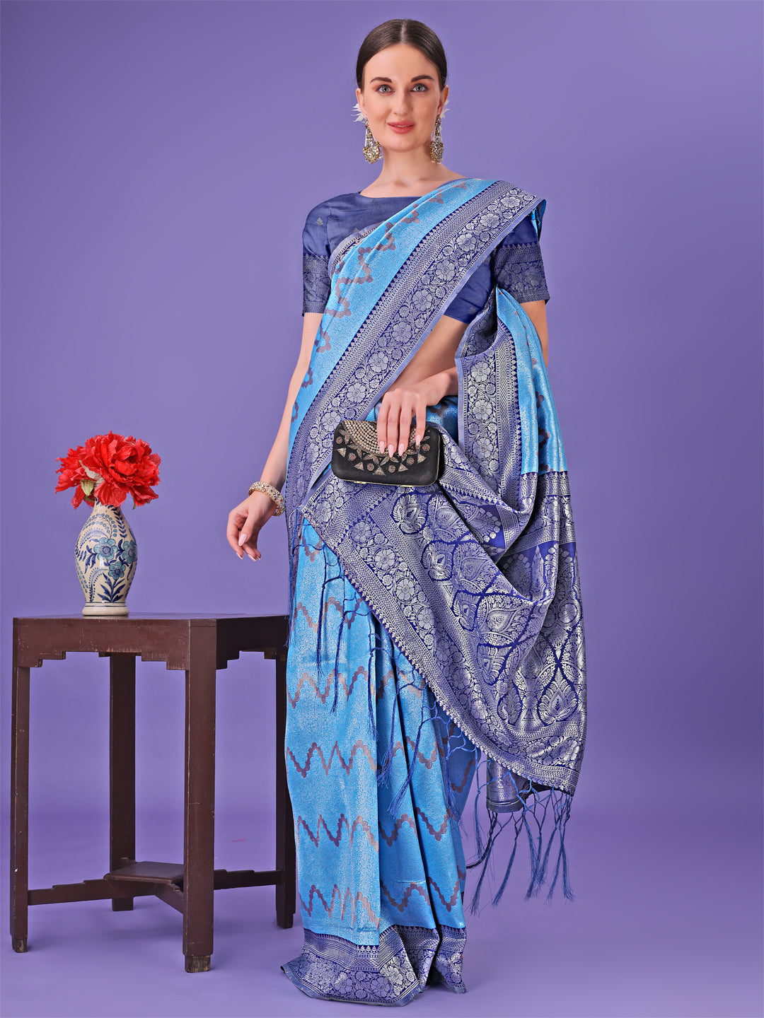 Astita Blue & Navy Blue Lichi Silk Saree with Rich Woven Border and Zigzag Pattern – Wedding & Festive Wear