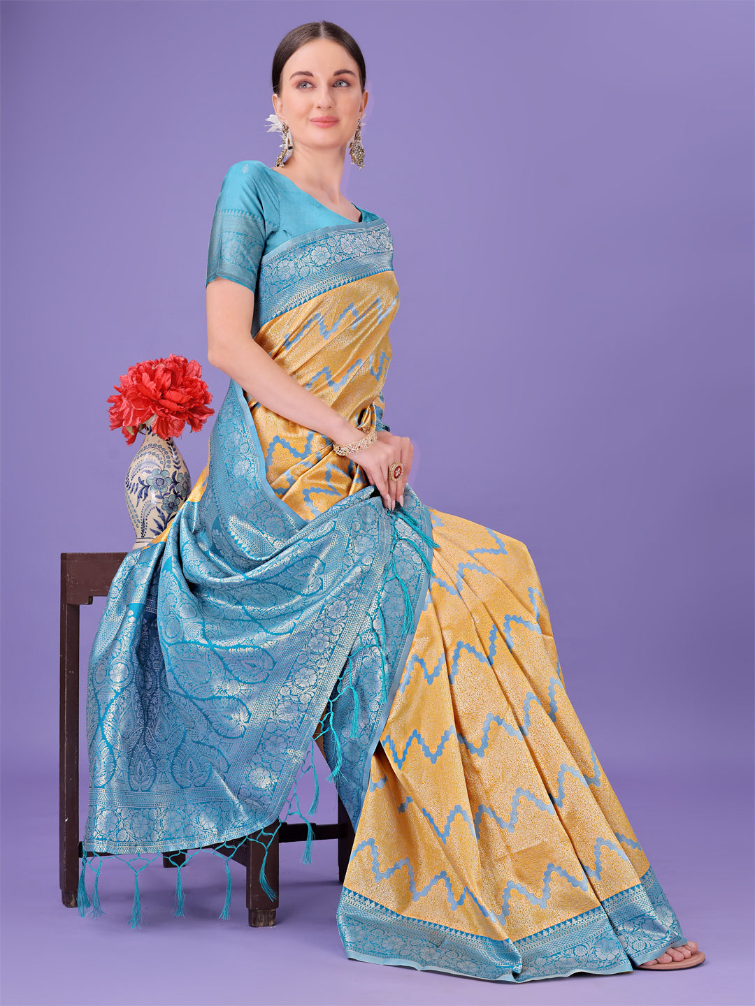 Astita Yellow & Sky Blue Lichi Silk Saree with Rich Woven Border and Zigzag Pattern – Wedding & Festive Wear