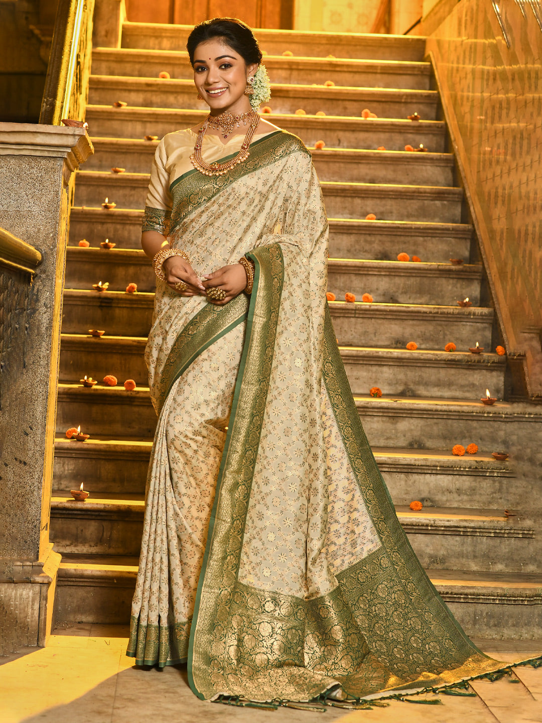 Astita Ivory and Green Banarasi Silk Saree with Golden Zari – Regal Elegance for Timeless Celebrations