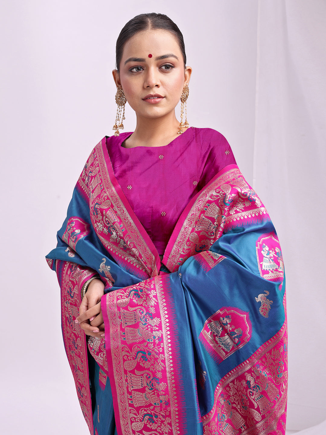 Astita Banarasi Silk Saree with Blue & Rani Pink Zari Work – Wedding & Festive Traditional Saree | Temple Border & Royal Motifs | Soft & Shiny Silk Finish
