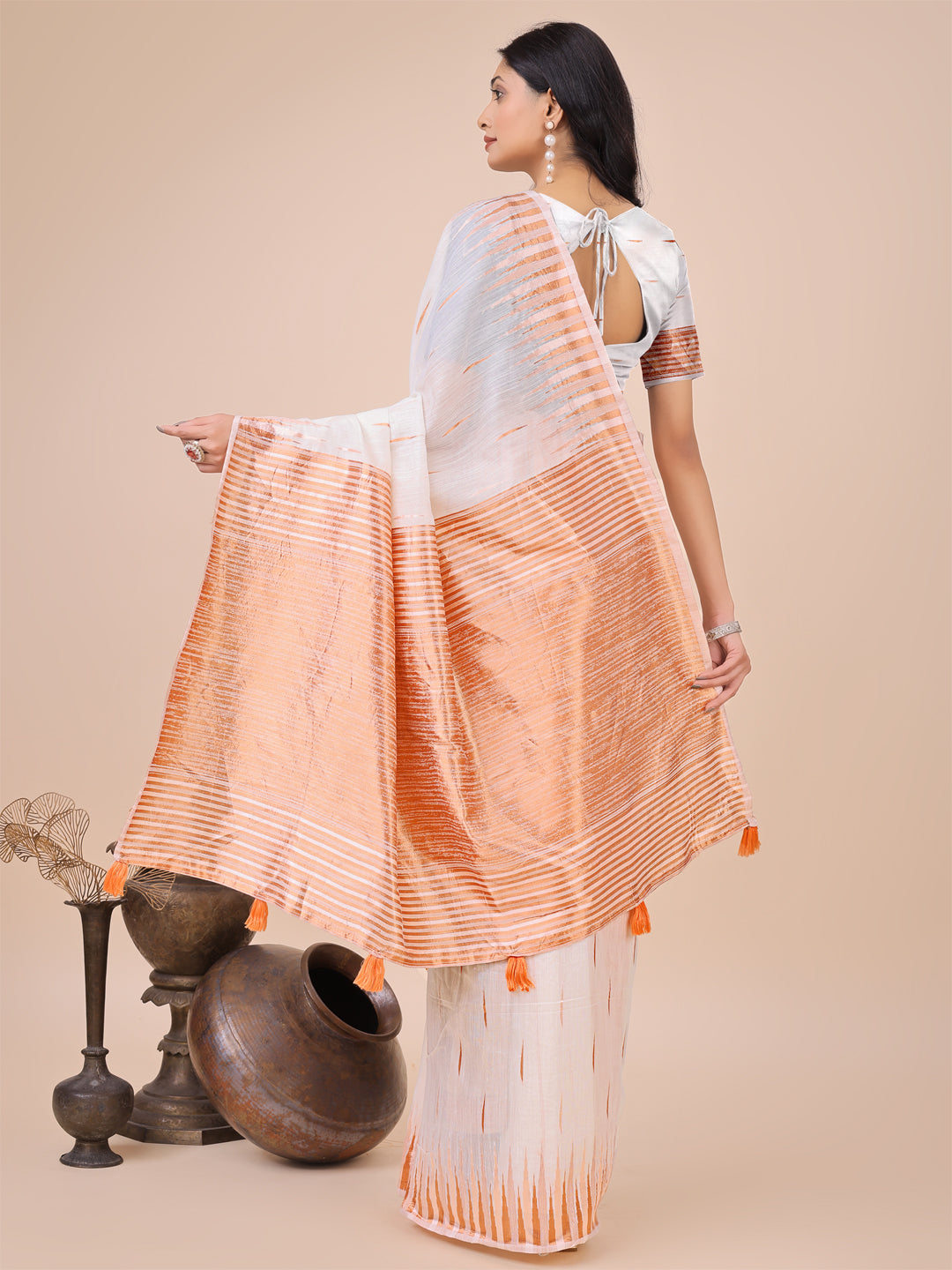 Elegant White Linen Cotton Saree with Copper Zari Pallu and Artistic Brush Pattern โ Festive & Formal Wear