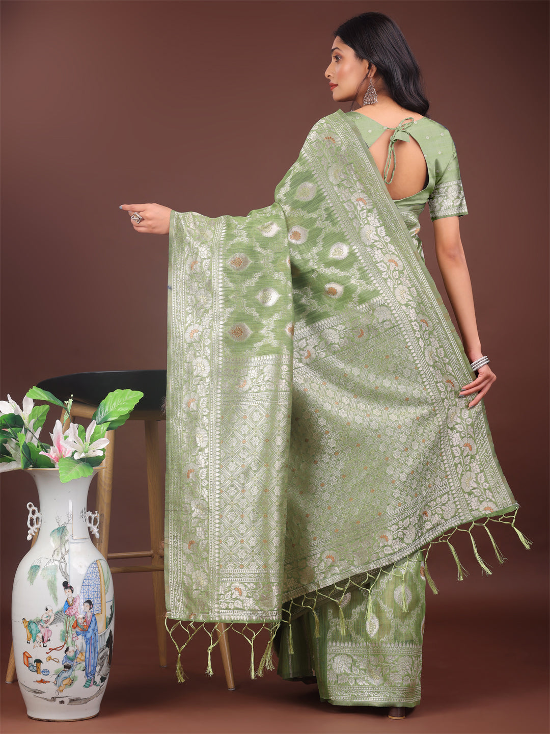 Astita Elegant Light Green Linen Cotton Saree with Silver Zari โ Perfect Blend of Comfort & Charm