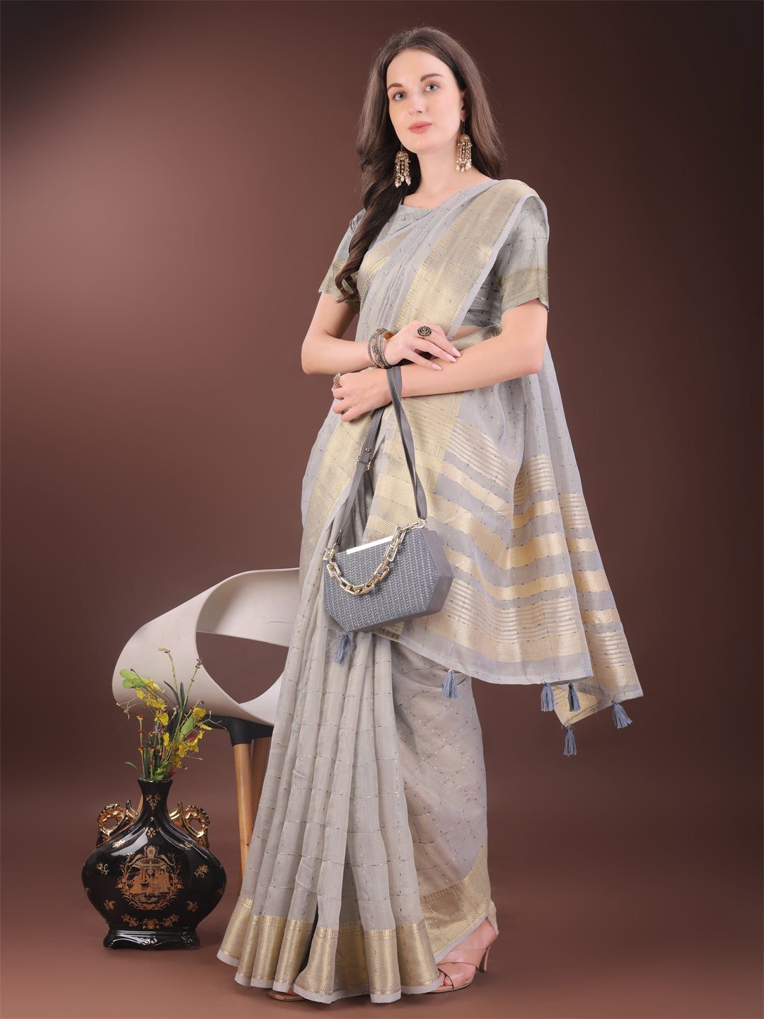 Astita Elegant Grey Organza Saree with Golden Zari Border & Designer Tassels | Lightweight Partywear Saree