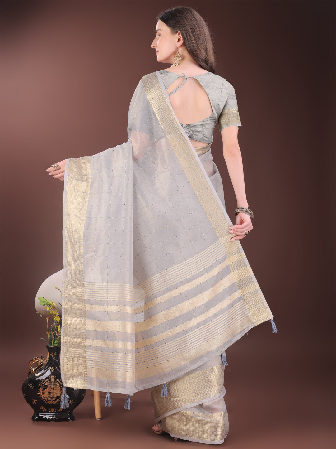 Astita Elegant Grey Organza Saree with Golden Zari Border & Designer Tassels | Lightweight Partywear Saree