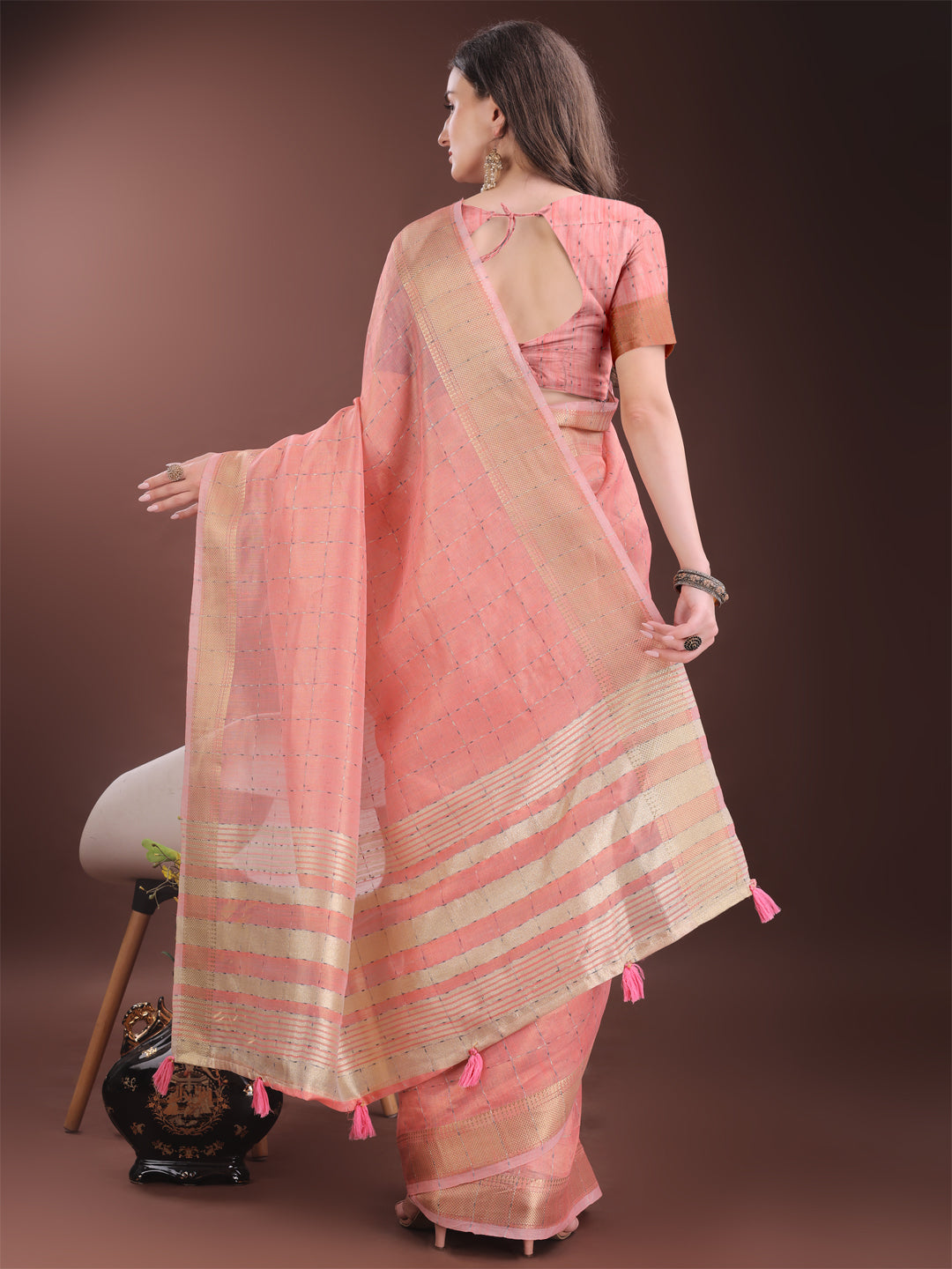 Astita Elegant Peach Organza Saree with Golden Zari Border & Designer Tassels | Lightweight Partywear Saree