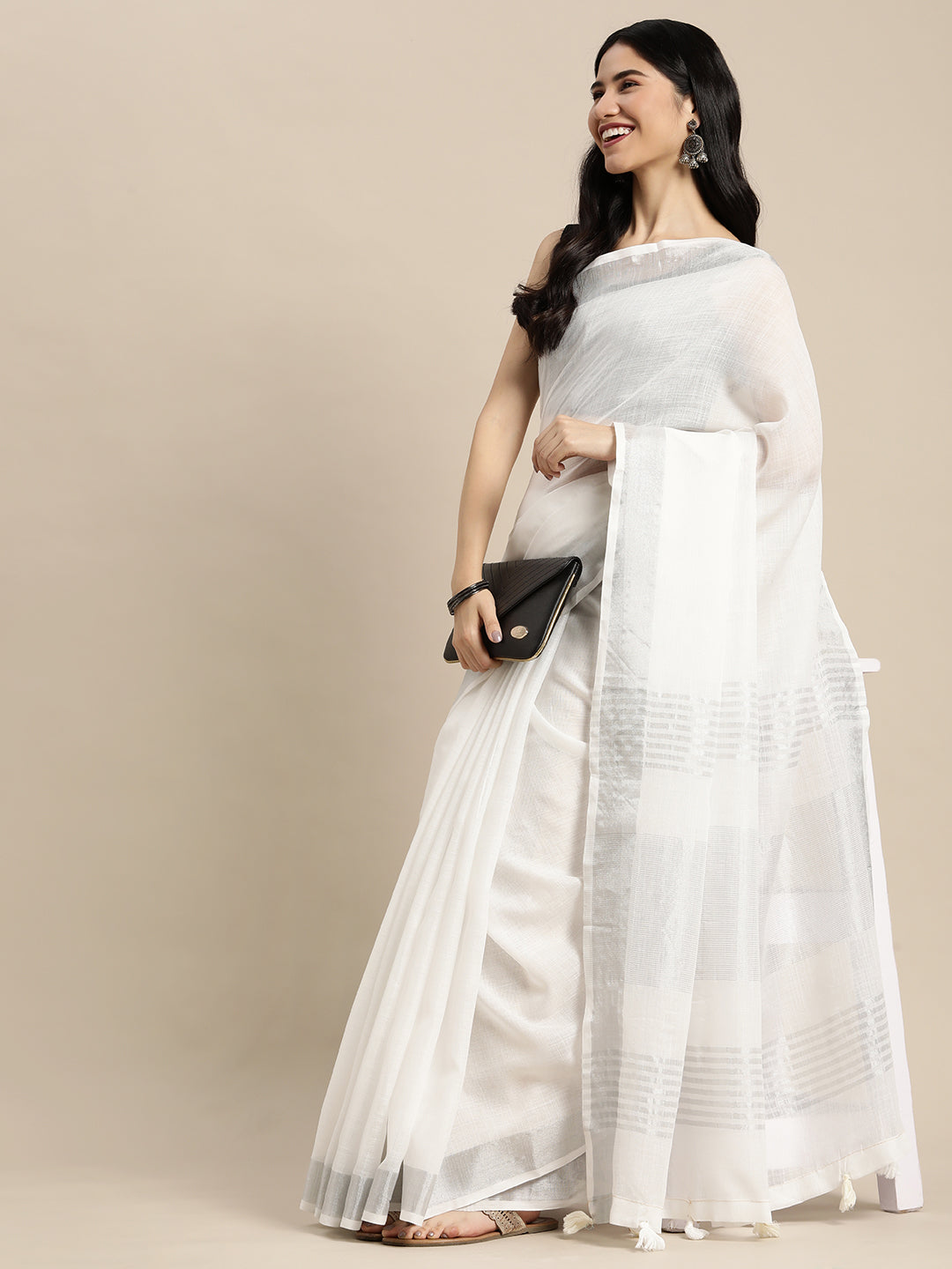 Off White Woven Linen Blend Saree with Silver Zari