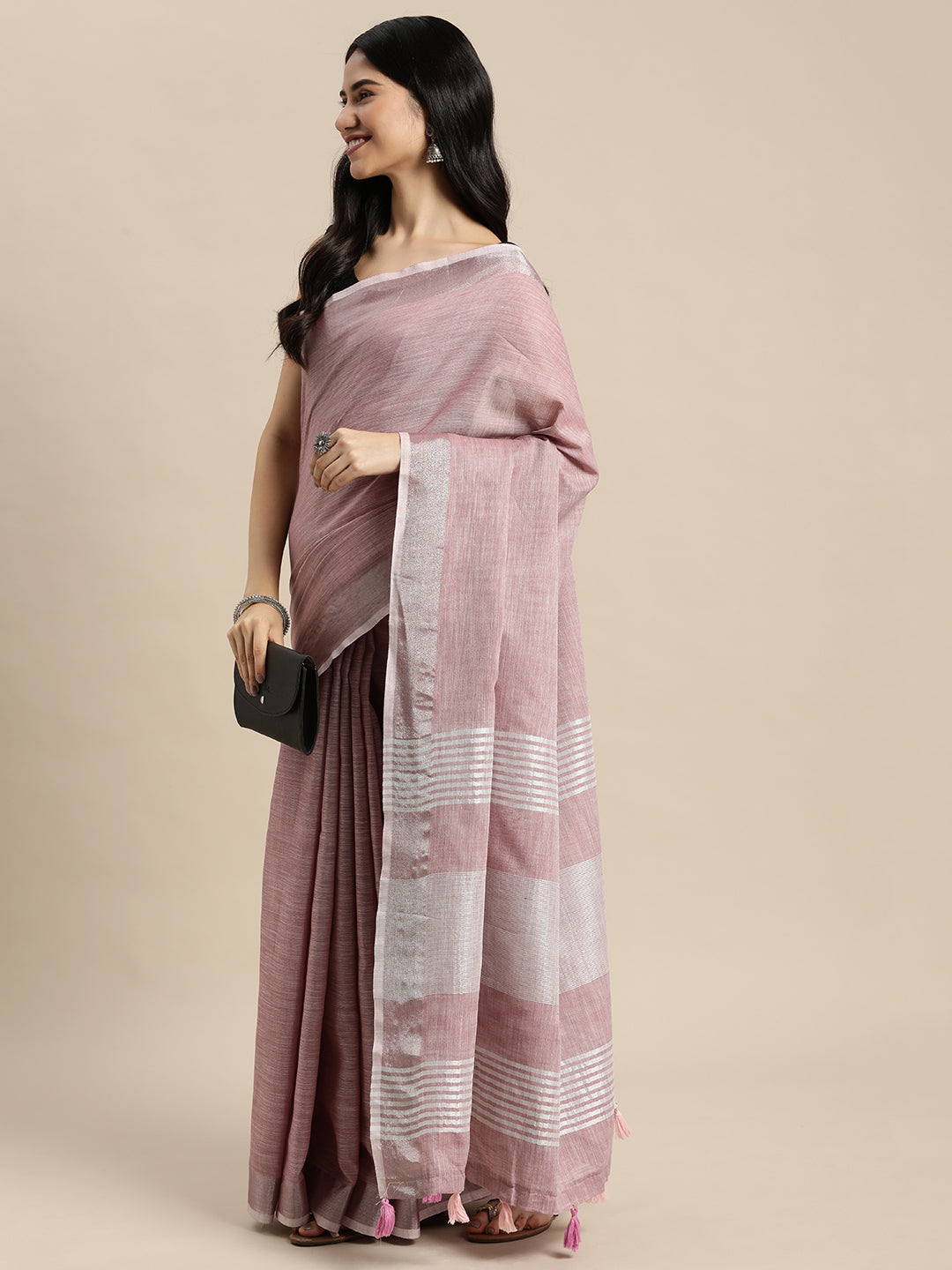 Astita Elegant Mauve Woven Linen Saree with Contrast Zari Border & Tassels – Soft & Breathable Party Wear