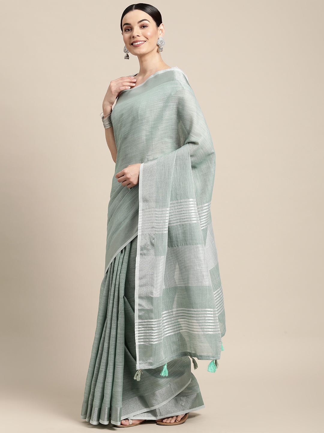Elegant Sea Green Woven Linen Saree with Contrast Zari Border & Tassels – Soft & Breathable Party Wear