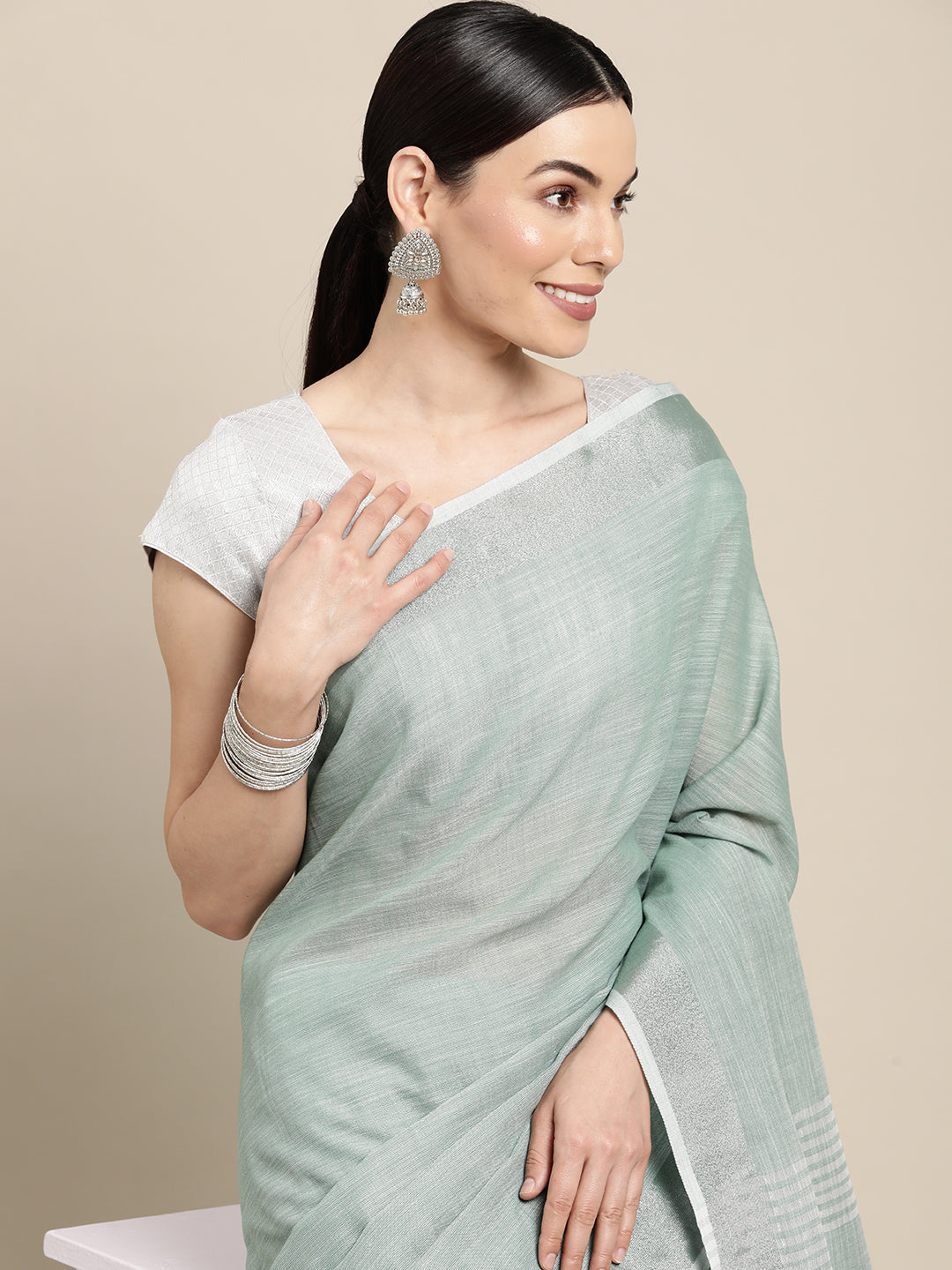 Elegant Sea Green Woven Linen Saree with Contrast Zari Border & Tassels – Soft & Breathable Party Wear