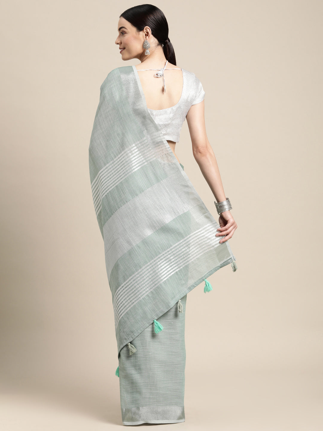 Elegant Sea Green Woven Linen Saree with Contrast Zari Border & Tassels – Soft & Breathable Party Wear