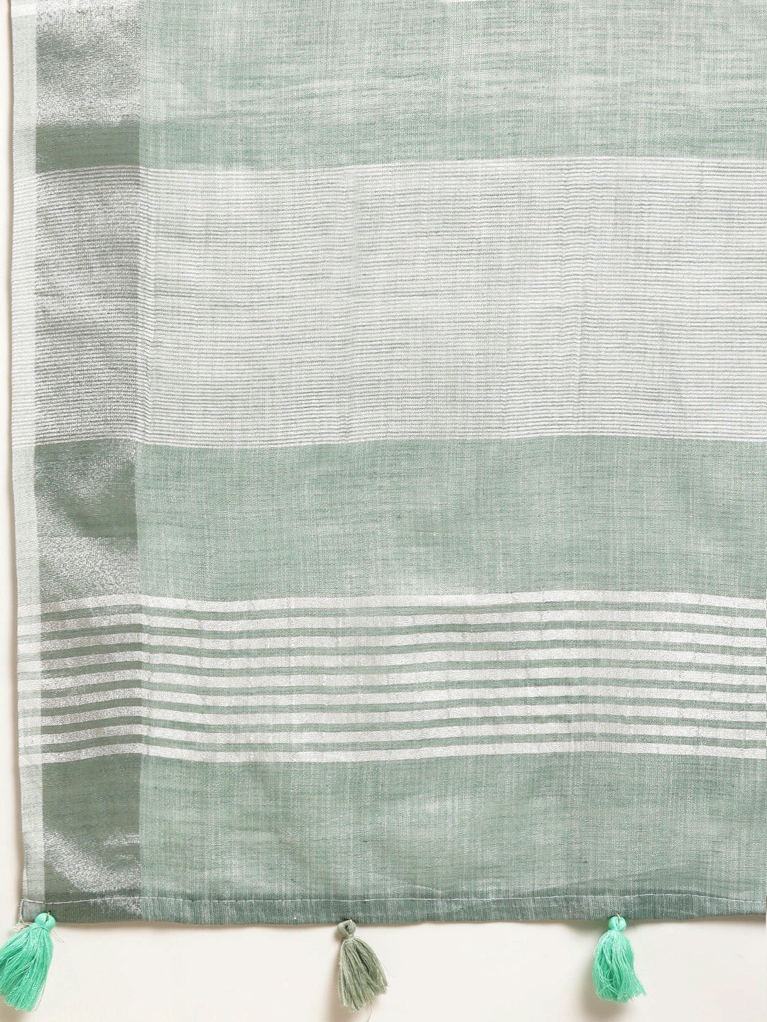 Elegant Sea Green Woven Linen Saree with Contrast Zari Border & Tassels – Soft & Breathable Party Wear