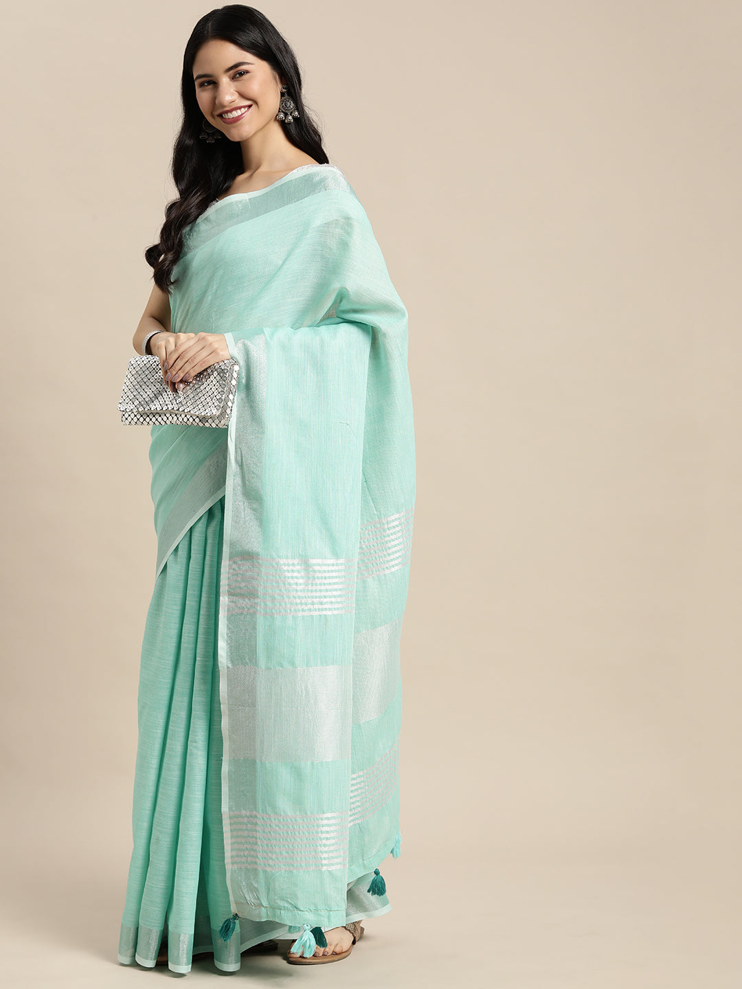 Elegant Turquoise Woven Linen Saree with Contrast Zari Border & Tassels – Soft & Breathable Party Wear