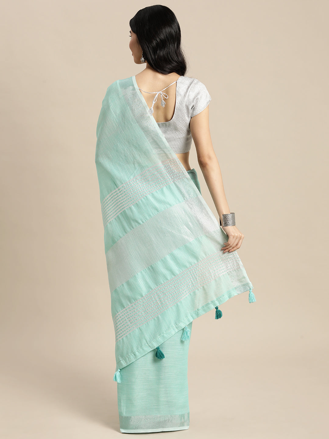 Elegant Turquoise Woven Linen Saree with Contrast Zari Border & Tassels – Soft & Breathable Party Wear