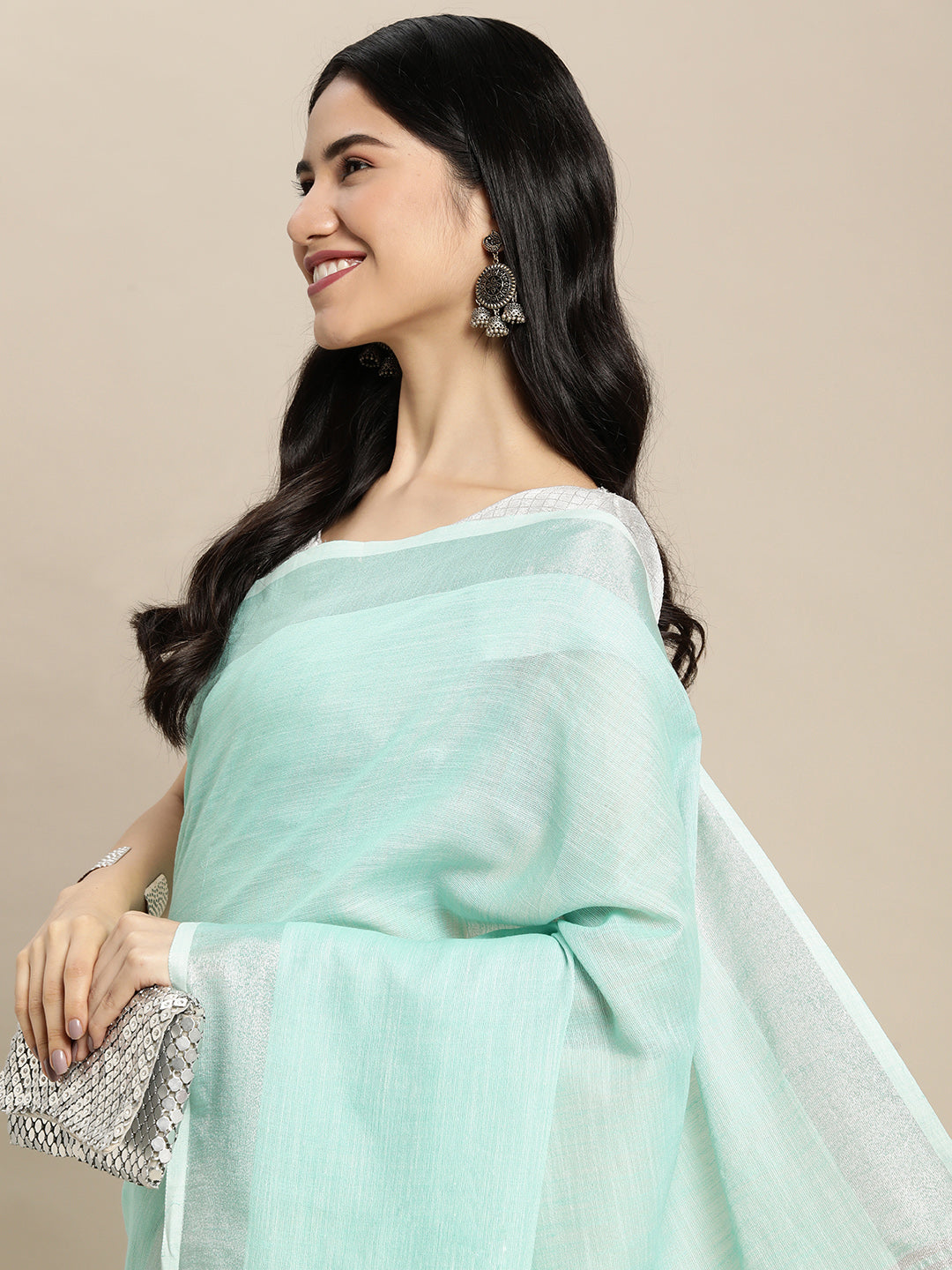 Elegant Turquoise Woven Linen Saree with Contrast Zari Border & Tassels – Soft & Breathable Party Wear