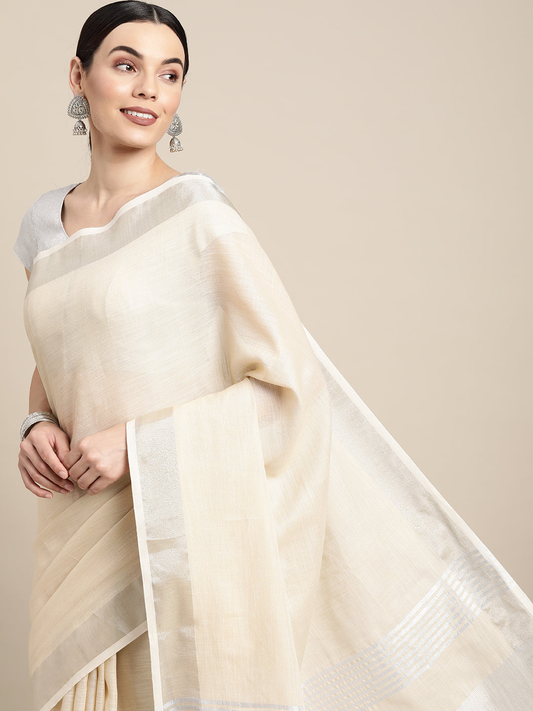 Elegant Beige Woven Linen Saree with Contrast Zari Border & Tassels – Soft & Breathable Party Wear