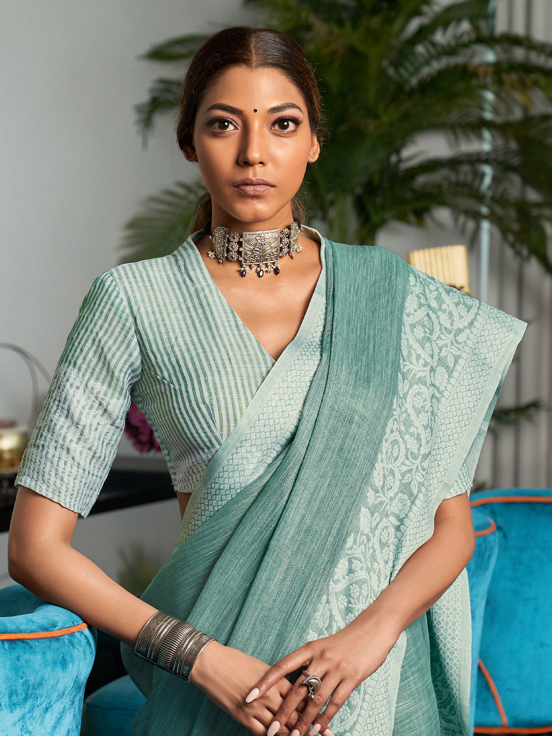 Elegant Sea Green Woven Linen Saree with Contrast Zari Border & Tassels – Soft & Breathable Party Wear