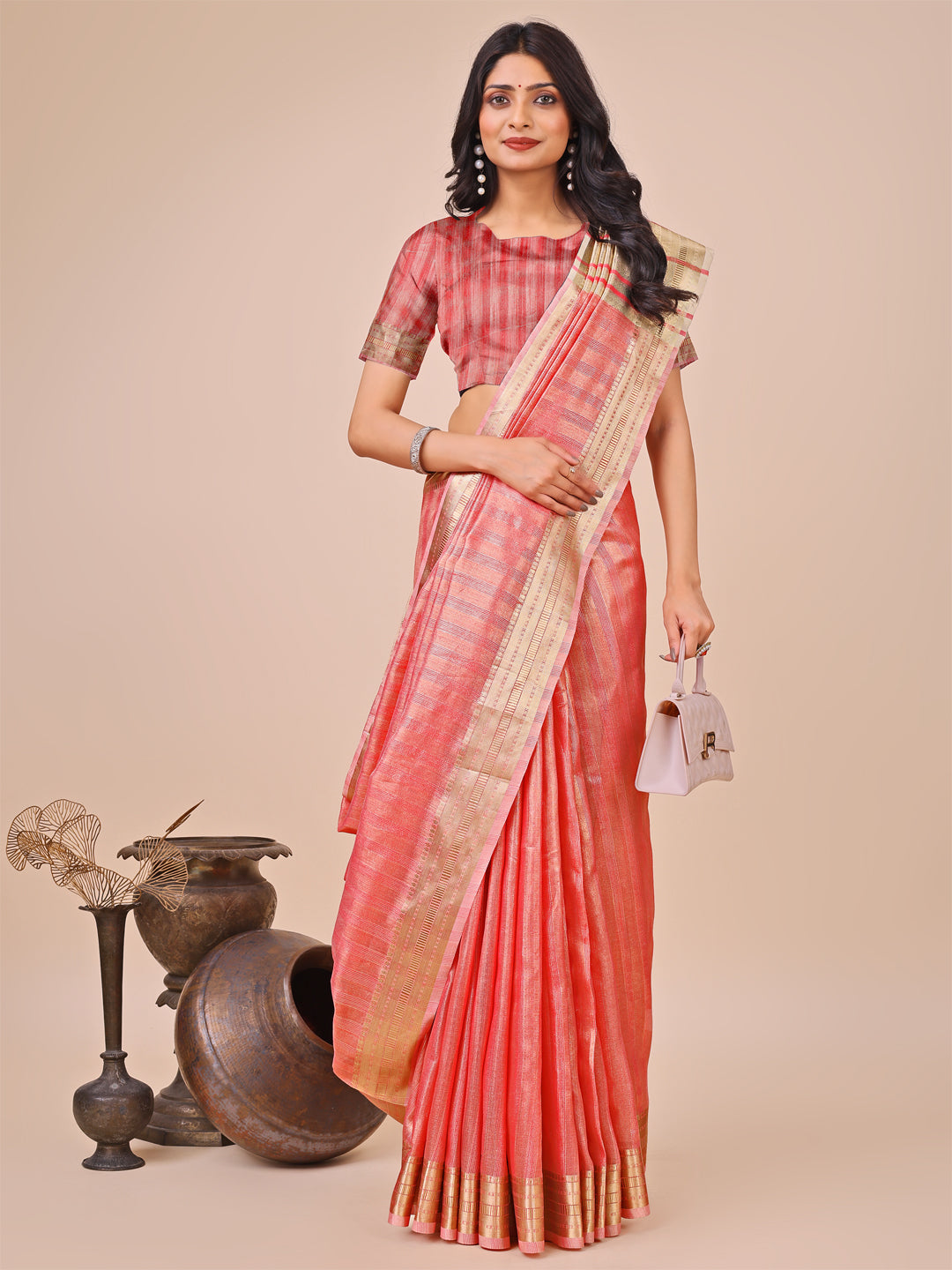 Astita Elegant Orange Organza Saree with Zari Border & Tassel Pallu – Lightweight Ethnic Wear for Festive & Wedding Occasions