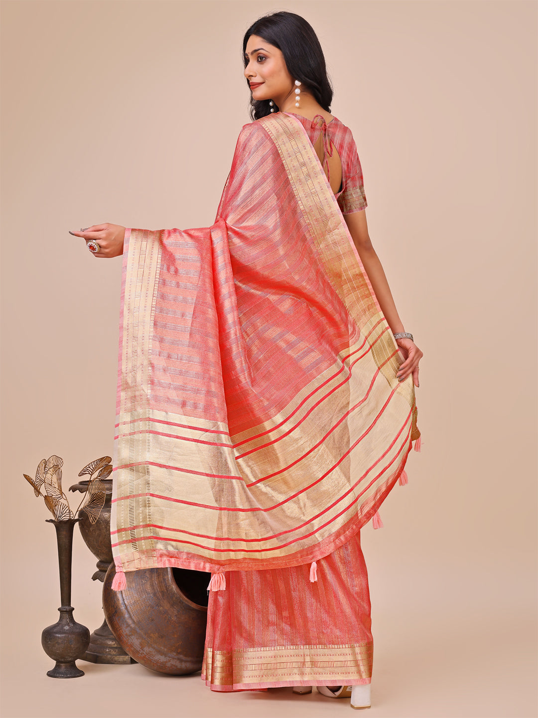 Astita Elegant Orange Organza Saree with Zari Border & Tassel Pallu – Lightweight Ethnic Wear for Festive & Wedding Occasions