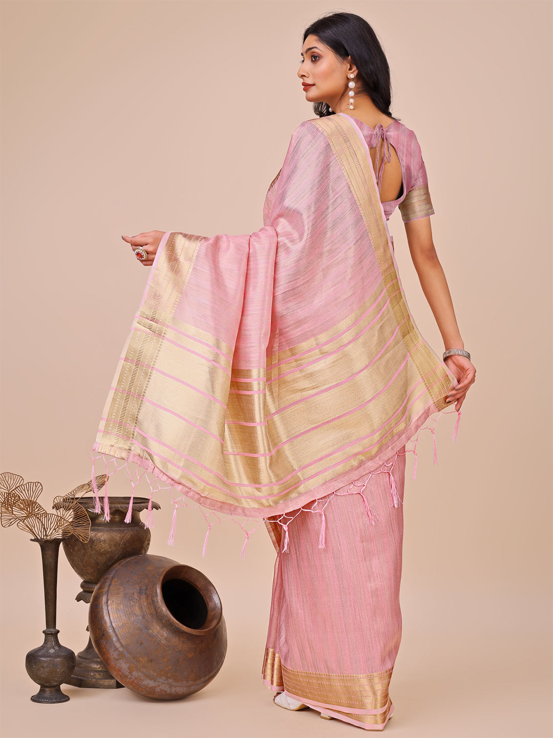 Astita Elegant Peach Organza Saree with Zari Border & Tassel Pallu – Lightweight Ethnic Wear for Festive & Wedding Occasions