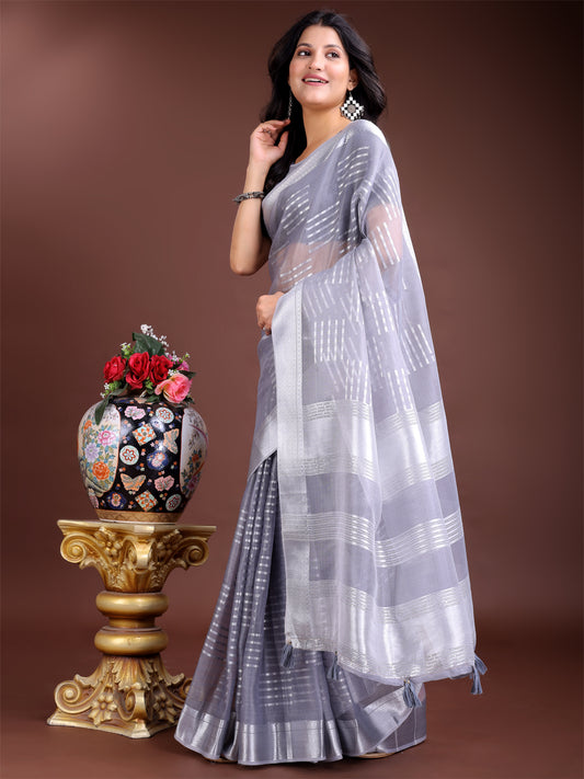 Astita Grey Organza Saree with Silver Zari Border & Pallu Tassels – Elegant Traditional Saree for Women
