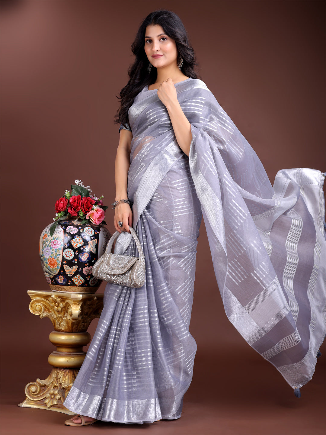 Astita Grey Organza Saree with Silver Zari Border & Pallu Tassels – Elegant Traditional Saree for Women