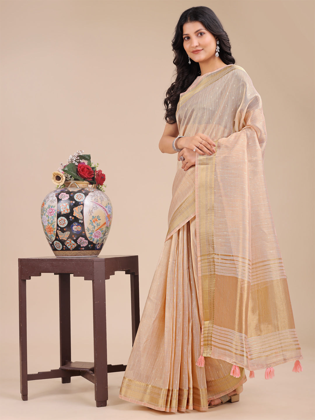 Astita Peach Organza Saree with Zari Border & Tassel Pallu – Lightweight Festive Saree for Women