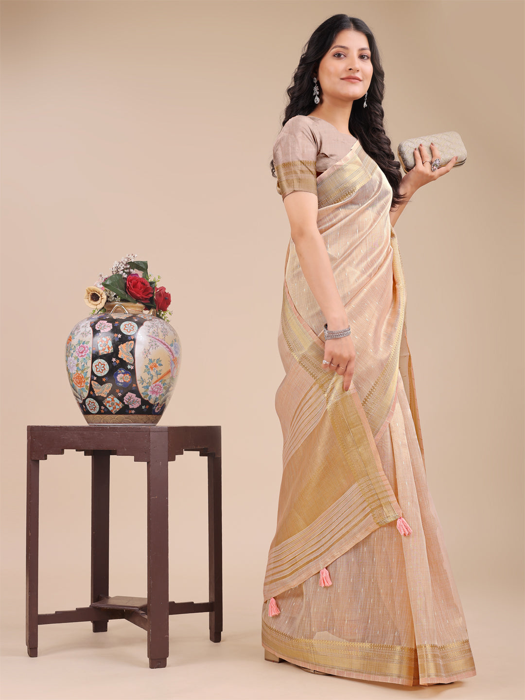 Astita Peach Organza Saree with Zari Border & Tassel Pallu – Lightweight Festive Saree for Women