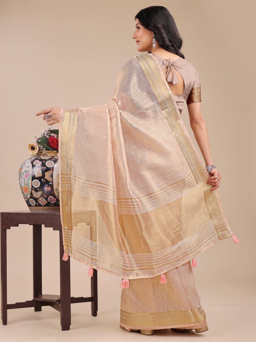Astita Peach Organza Saree with Zari Border & Tassel Pallu – Lightweight Festive Saree for Women
