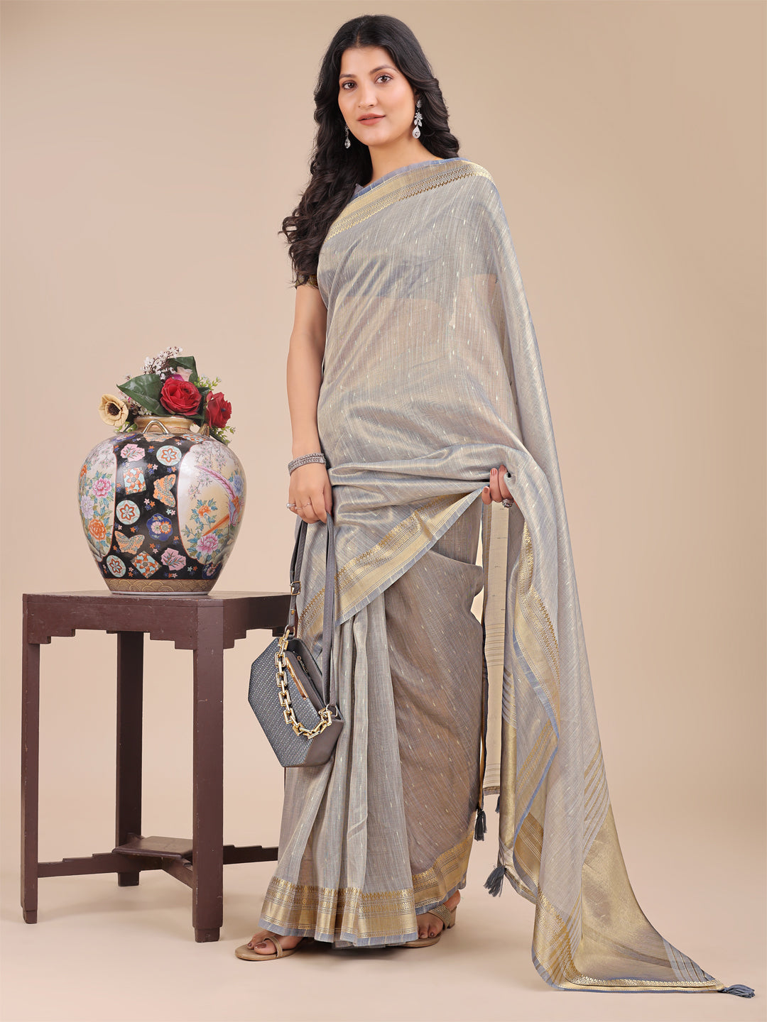 Astita Grey Organza Saree with Zari Border & Tassel Pallu – Lightweight Festive Saree for Women