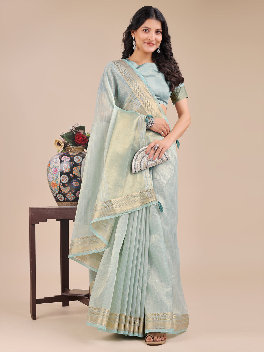 Astita Sea Green Organza Saree with Zari Border & Tassel Pallu – Lightweight Festive Saree for Women