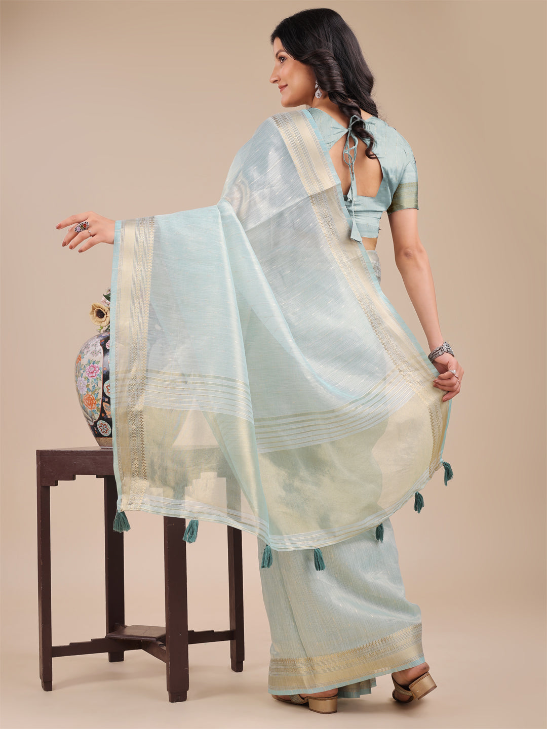 Astita Sea Green Organza Saree with Zari Border & Tassel Pallu – Lightweight Festive Saree for Women