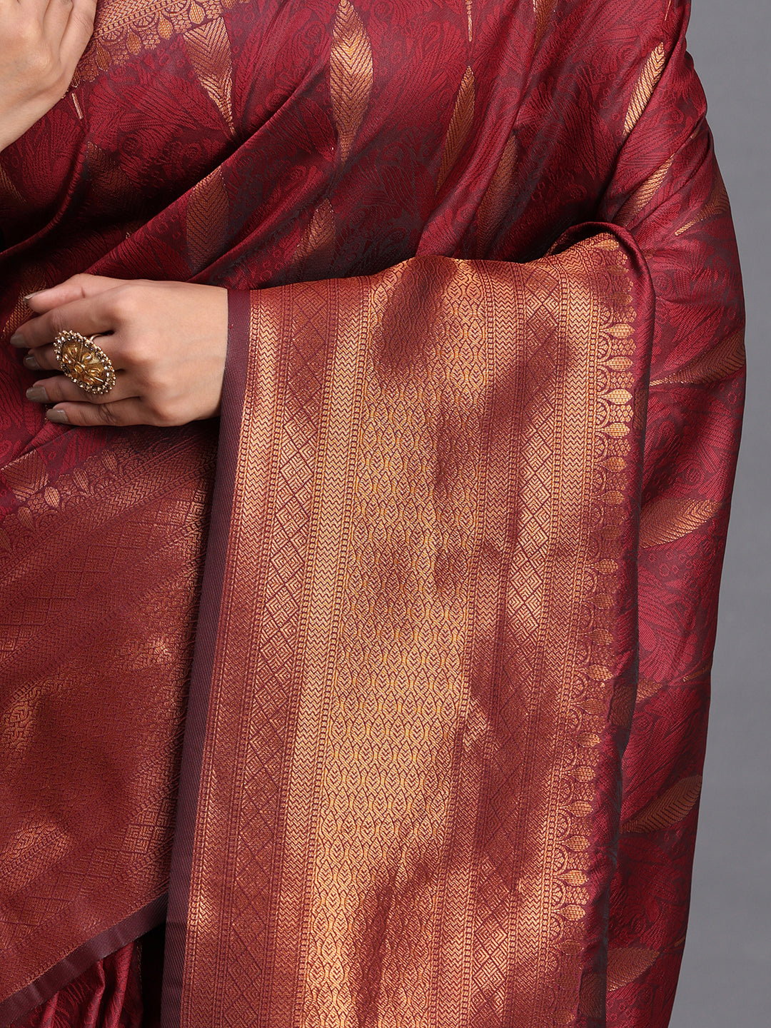 Astita Maroon Banarasi Silk Saree with Copper Zari Woven Pallu & Feather Butta – Wedding & Festive Wear