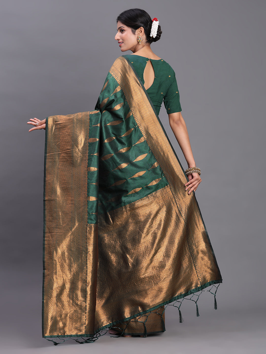 Astita Dark Green Banarasi Silk Saree with Copper Zari Woven Pallu & Feather Butta – Wedding & Festive Wear