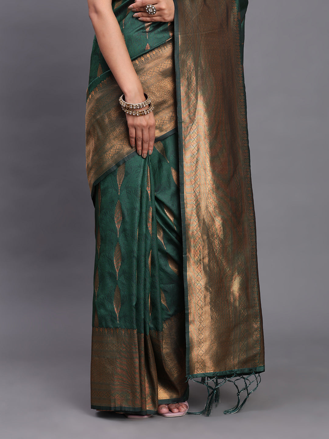 Astita Dark Green Banarasi Silk Saree with Copper Zari Woven Pallu & Feather Butta – Wedding & Festive Wear