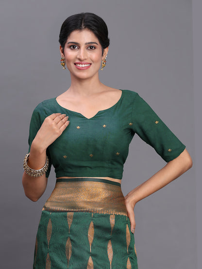 Astita Dark Green Banarasi Silk Saree with Copper Zari Woven Pallu & Feather Butta – Wedding & Festive Wear